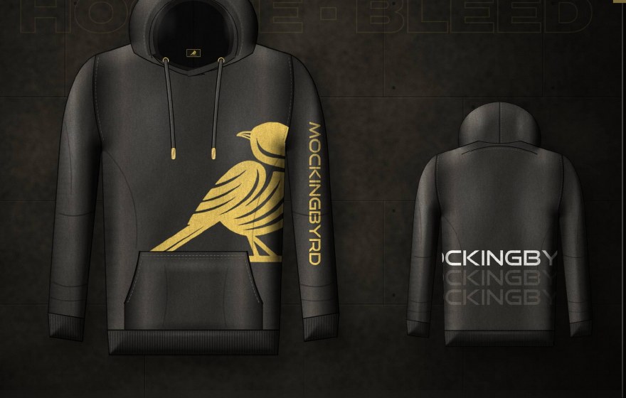 Mockingbyrd heavyweight black hoodie with the gold bird and wordmark